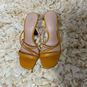 Leather mule with wooden heel